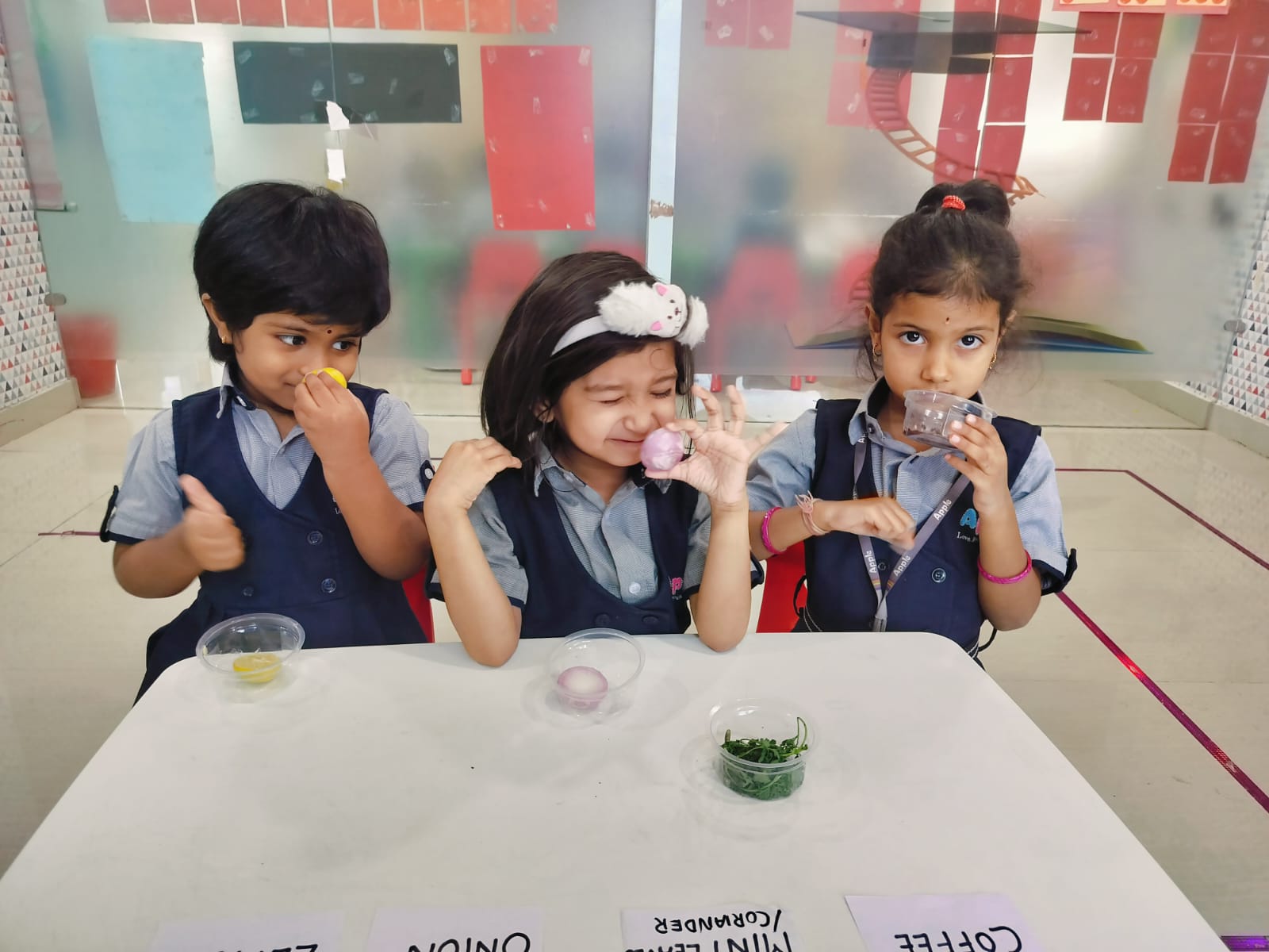 Teacher encouraging preschool children